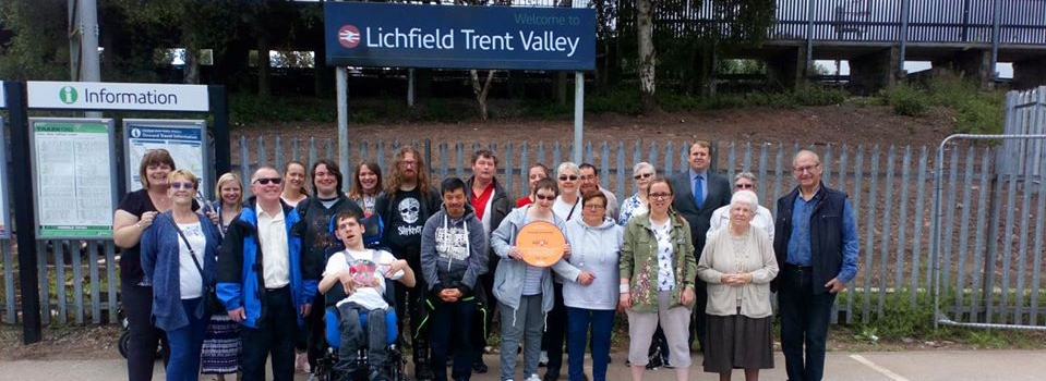 Friends 2 Friends members collecting their plaque at Lichfield Trent Valley